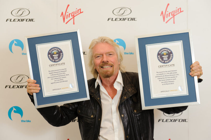 Sir Richard Branson with Guinness World Record certificates